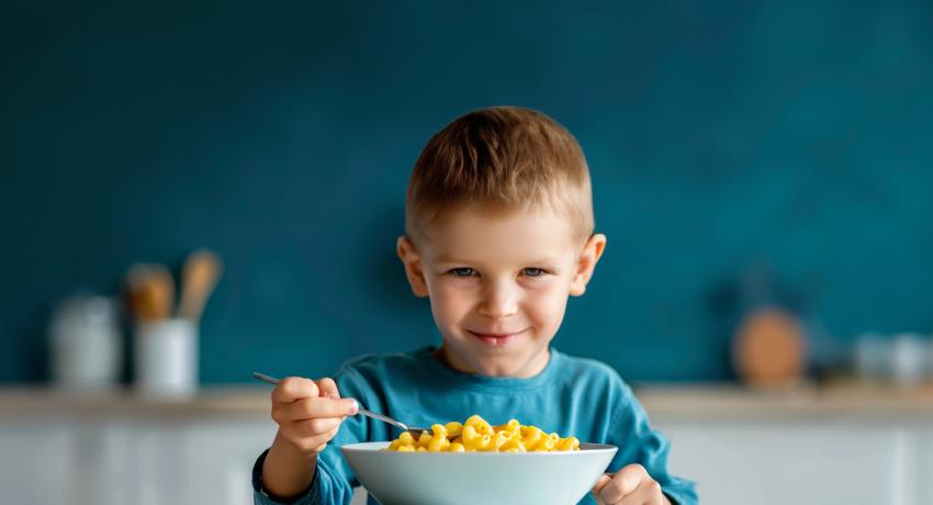 Boy Eating Mac N Cheese