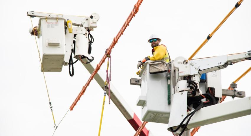 Lineworker in bucket truck