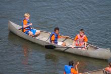 Camp Kilowatt campers canoeing