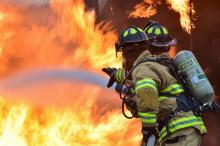 Firefighters Hosing Fire