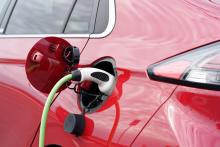 Red electric car charging